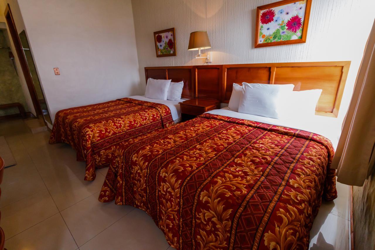 Hotel Anna Inn Olintepeque Habitación foto